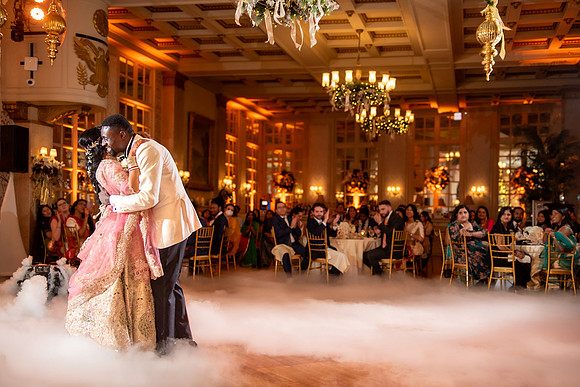 Bride and groom celebrating their wedding at Franklin Plaza in Troy, NY. Professional photography by Studio Lana, serving Albany, Troy, Saratoga Springs, and the Capital Region.
