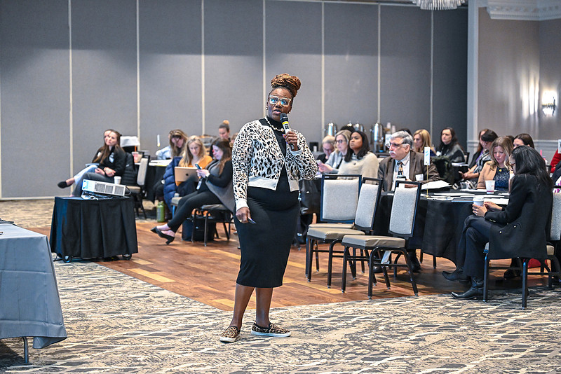Corporate speaker presenting at Albany conference