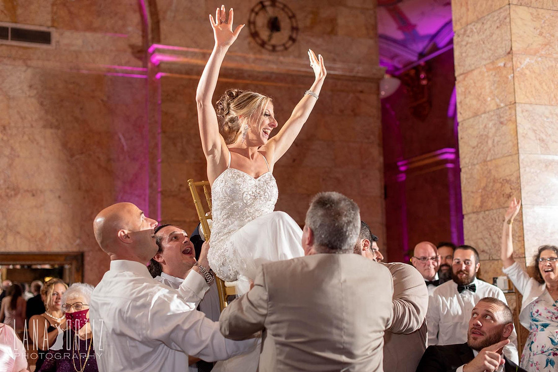 Bride lifted on a chair during a traditional Jewish hora dance at The State Room wedding venue in Albany, New York.
5. Groom's Hora Dance — IMG_3338.JPG