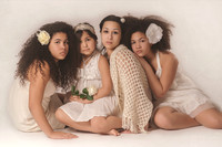 Elegant vintage-inspired family portrait photographed by Studio Lana in Albany, NY. Artistic fine-art portrait session featuring four sisters styled in warm, timeless tones.